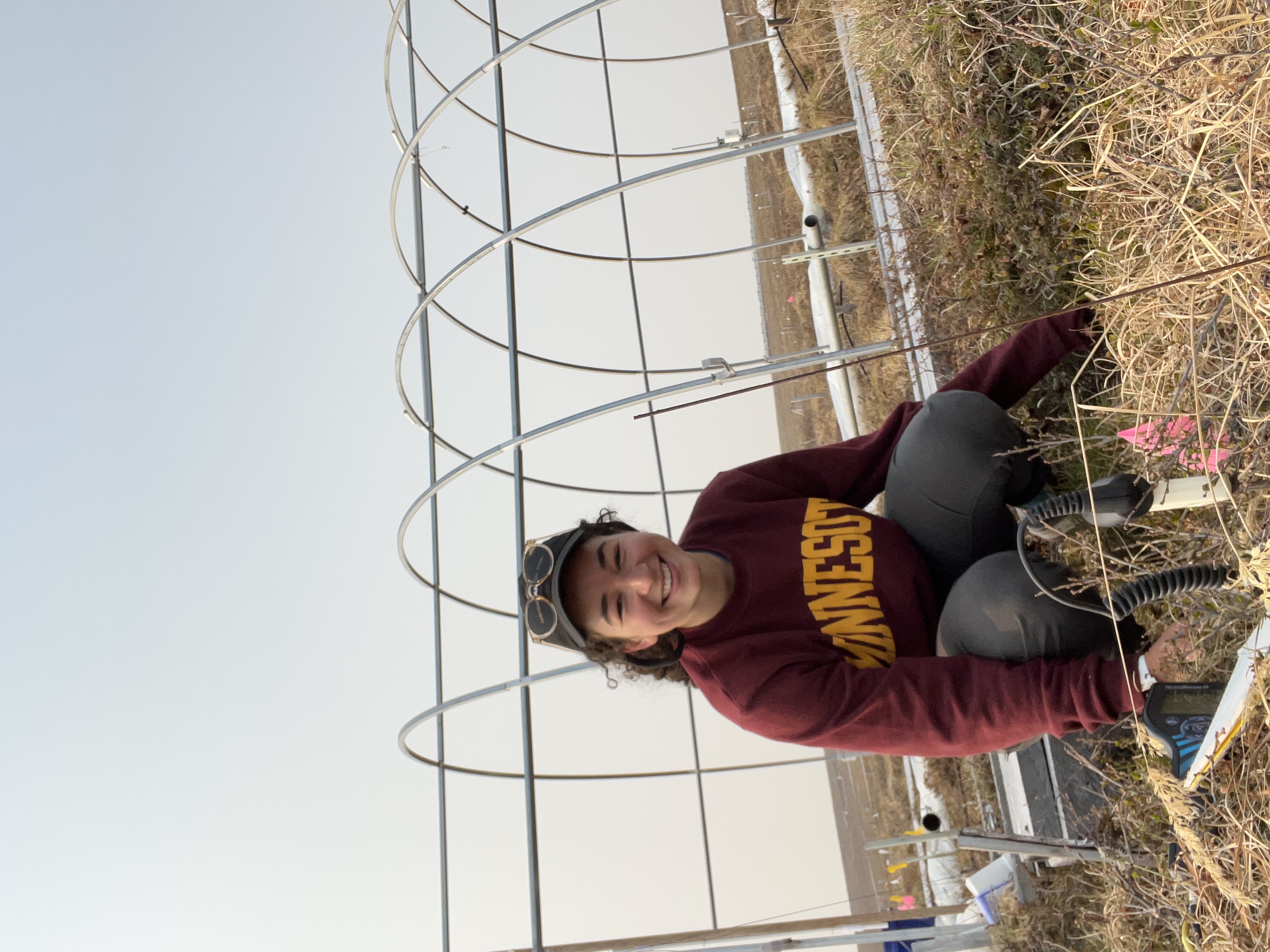 Researcher Megan Wilcots samples soils in the long-term fertilization plots near Toolik Field Station.