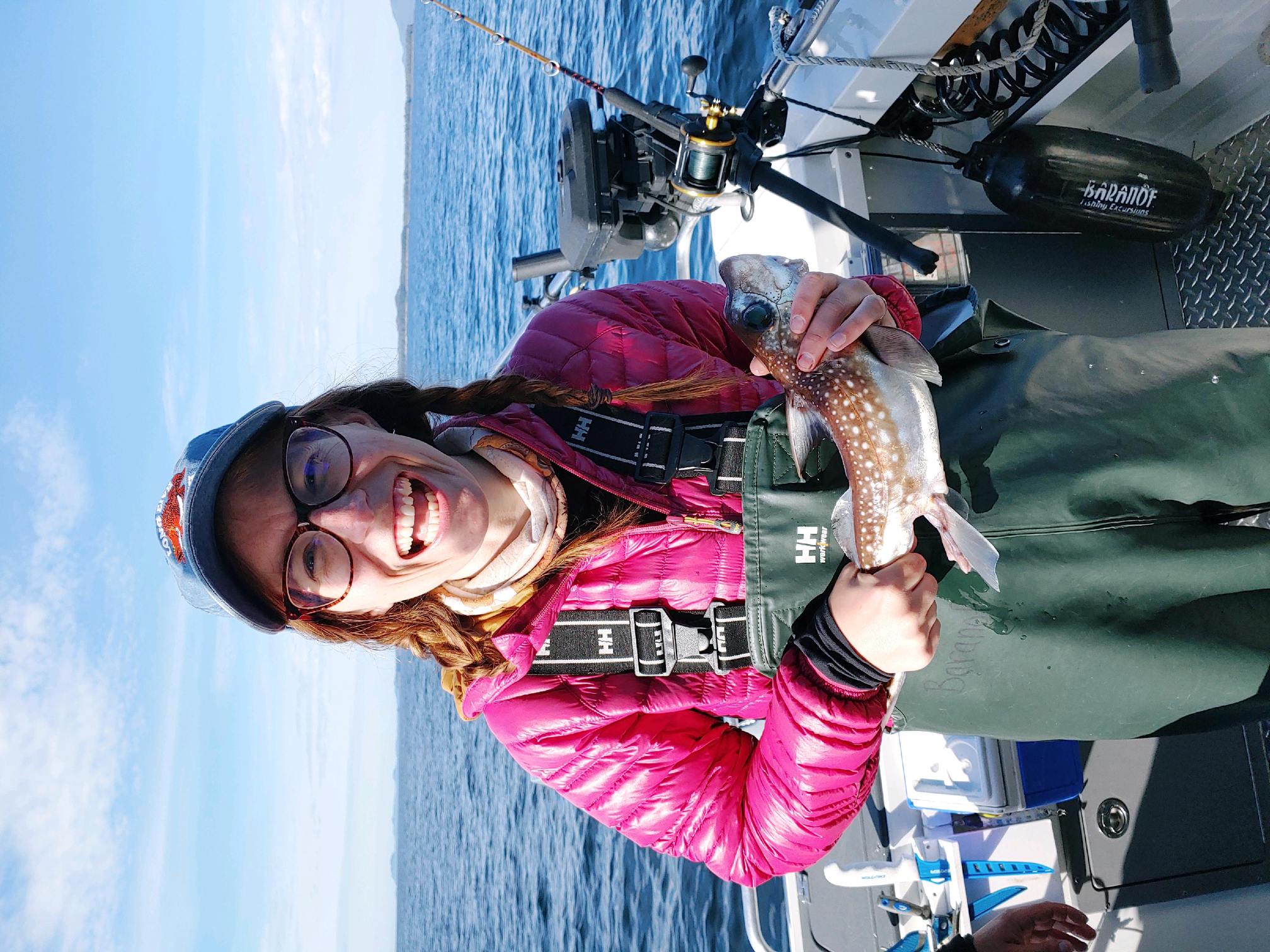 Researcher Morag Clinton samples fish on a boat.